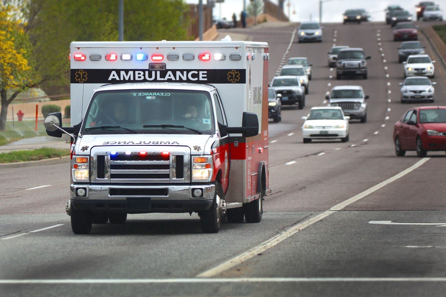 an ambulance on the way to a car accident